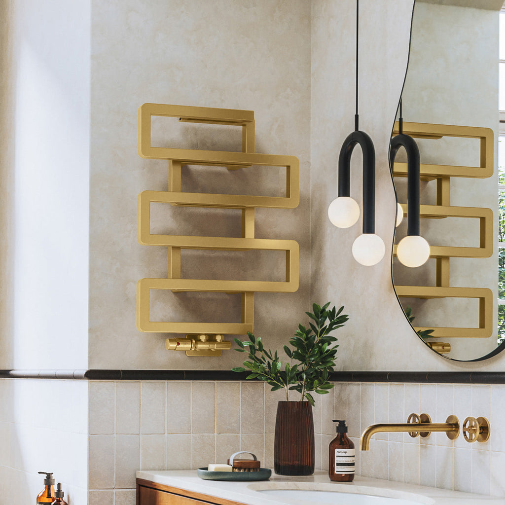 01_Terma-BOOKIE_-655h-x-500w_mm_-1278-BTUs-Heated-Towel-Rail_-Brass