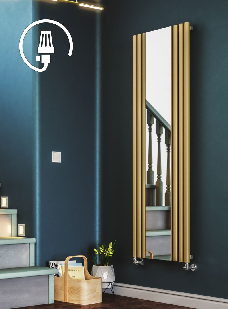 brass electric mirror radiator on a blue wall in a hallway next to the staircase with wooden floor