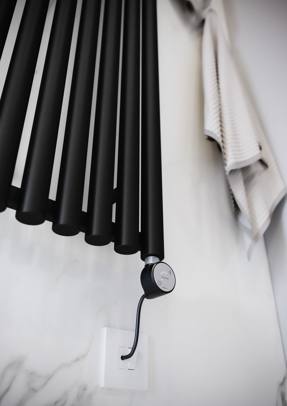 07_TermaoilfilledelectricradiatorsuppliedwiththeTermaMOABlue_bluetooth_heatingelement-smartphonecontrolled_fullythermostaticelementandaroundclockfacestylehead